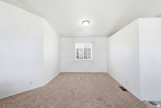 2491 Highway 89, Unit 614 Pleasant View, UT 84404 - Photo 16 of 27 Neutral wall finishes and light brown carpeting