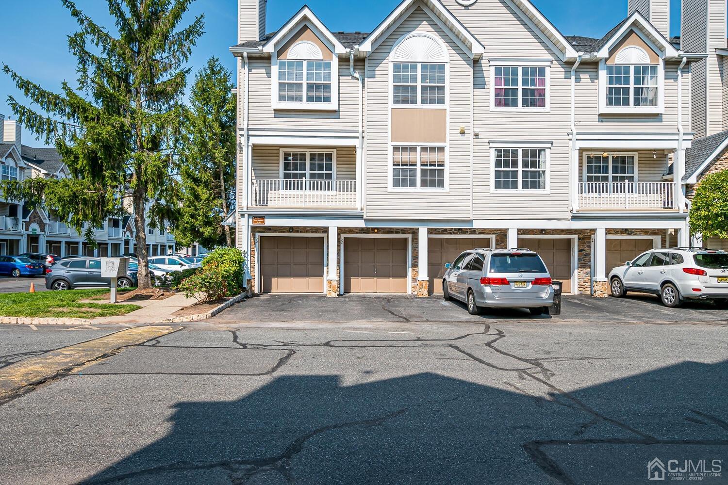 22 Prestwick Way Edison, NJ 08820 - Photo 1 of 24 a car parked on the side of a street