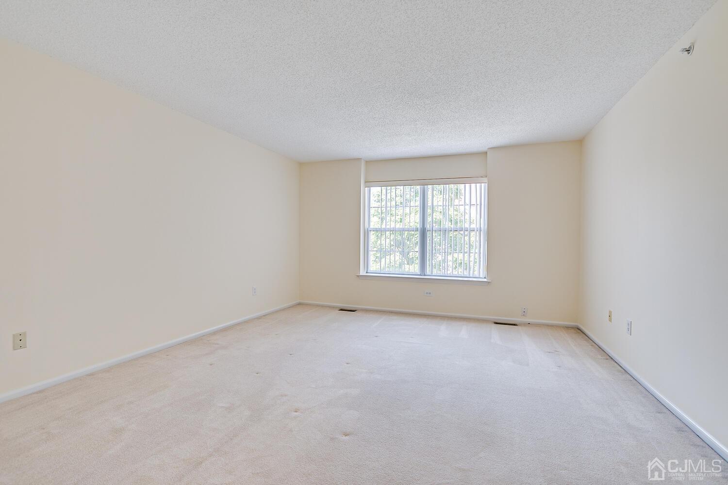 22 Prestwick Way Edison, NJ 08820 - Photo 14 of 24 an empty room with a window