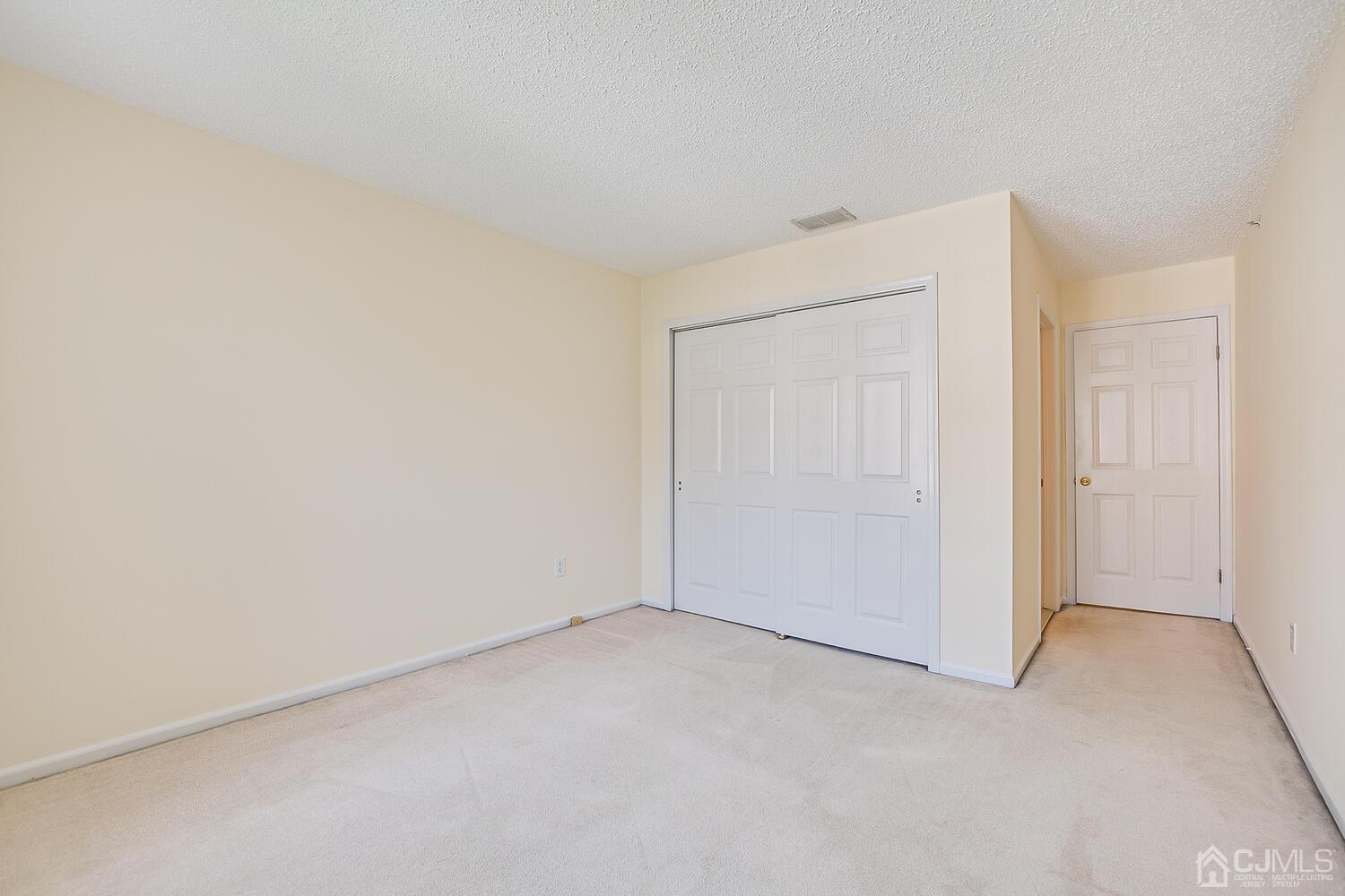 22 Prestwick Way Edison, NJ 08820 - Photo 22 of 24 an empty room with closet area