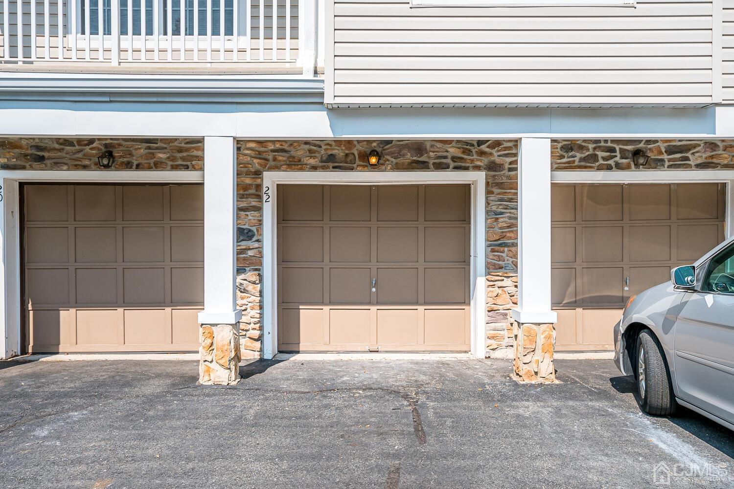 22 Prestwick Way Edison, NJ 08820 - Photo 3 of 24 a view of a car garage door
