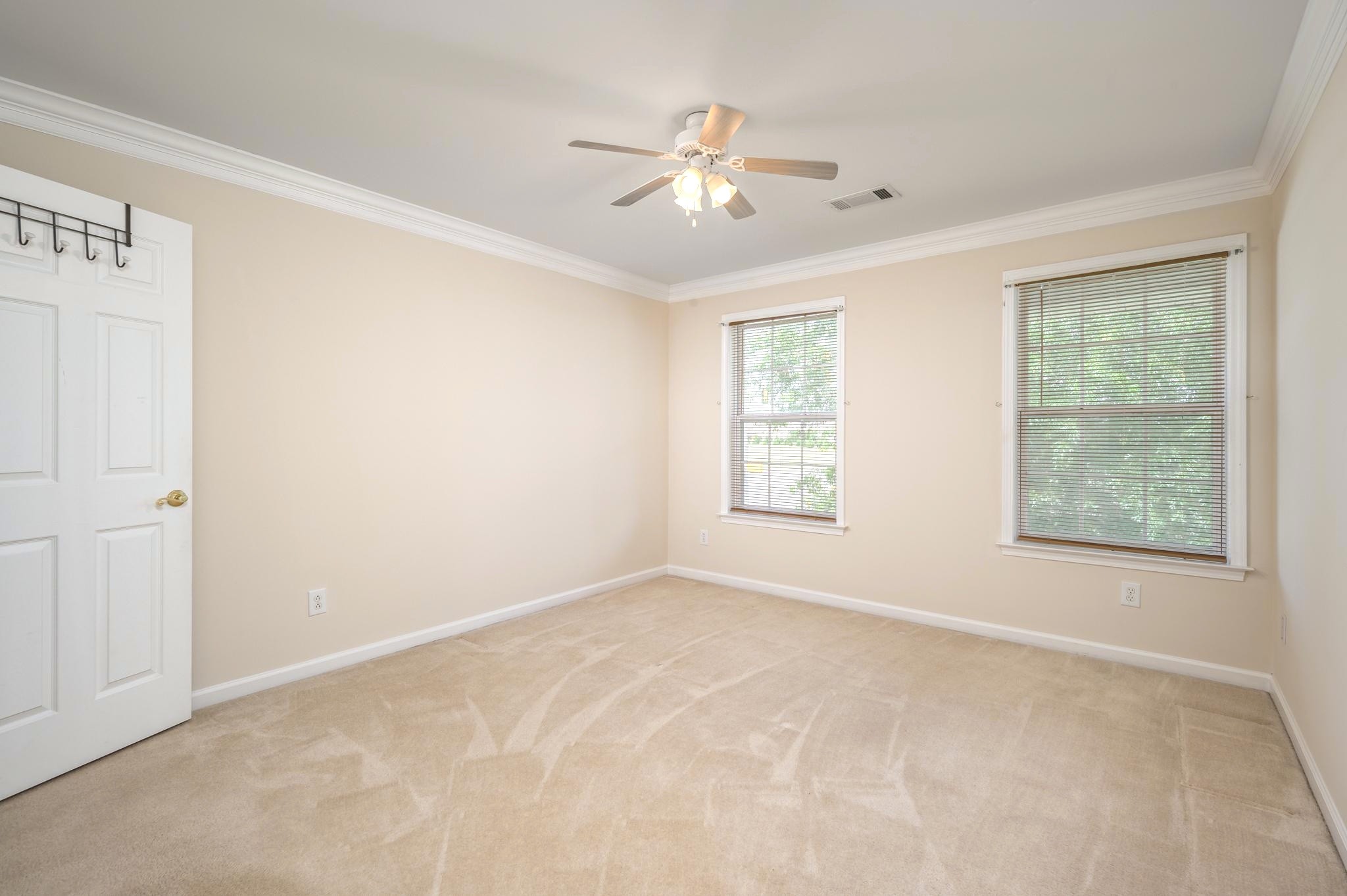 2901 Buckner Lane Spring Hill, TN 37174 - Photo 22 of 28 an empty room with windows and fan