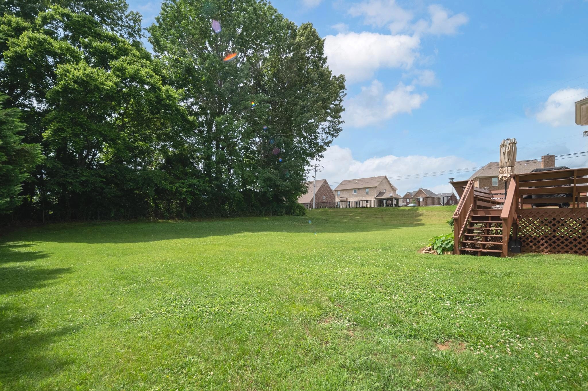 2901 Buckner Lane Spring Hill, TN 37174 - Photo 26 of 28 a view of a garden with a bench in the background