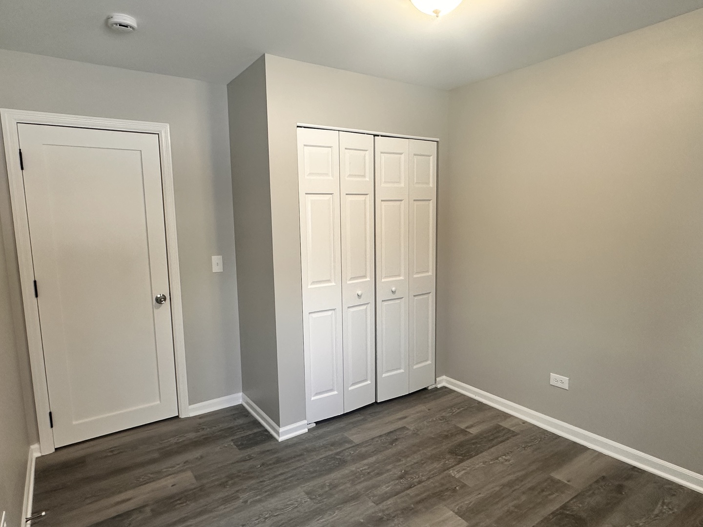 518 Spring Street Streator, IL 61364 - Photo 9 of 17 a view of an empty room with wooden floor