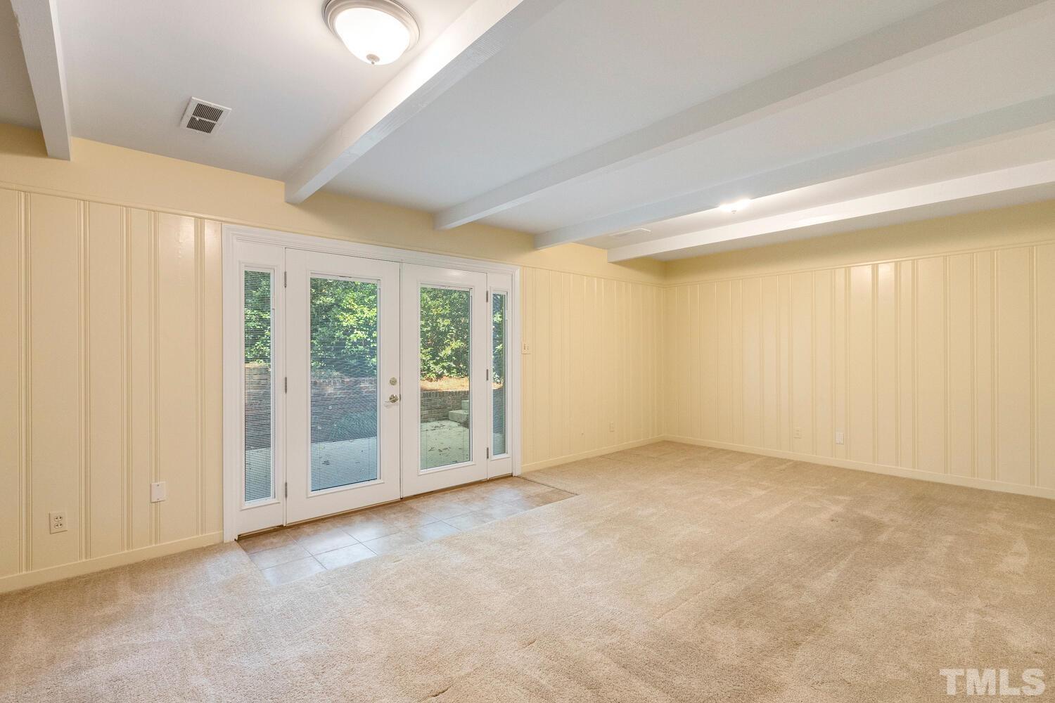 5004 Rembert Drive Raleigh, NC 27612 - Photo 33 of 61 an empty room with windows