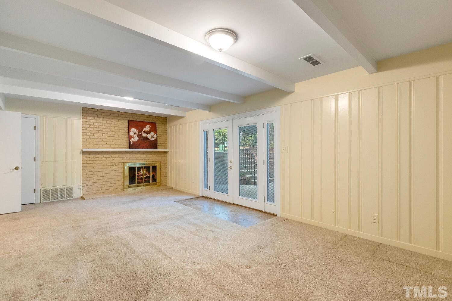 5004 Rembert Drive Raleigh, NC 27612 - Photo 36 of 61 an empty room with a empty space and windows