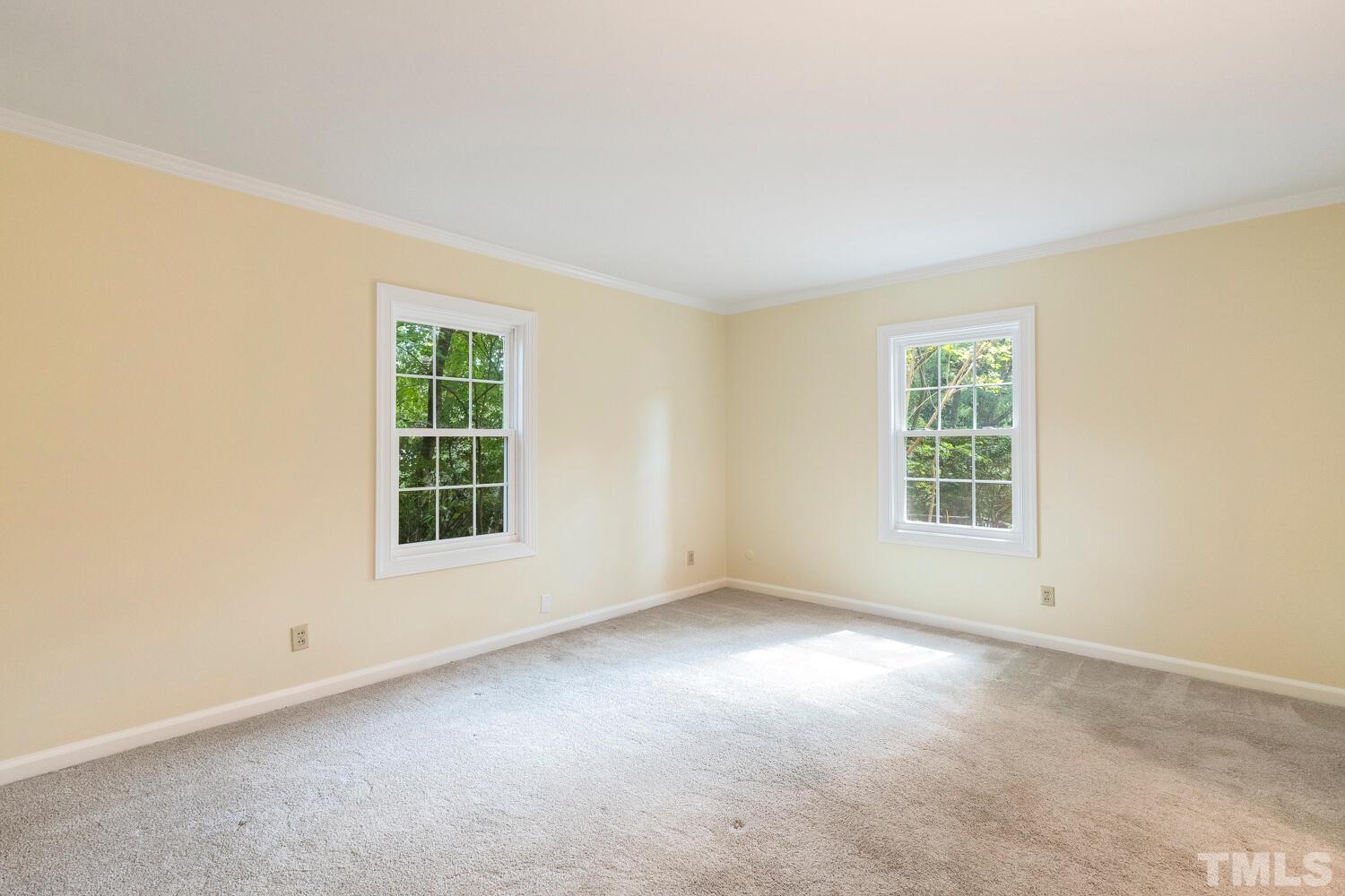 5004 Rembert Drive Raleigh, NC 27612 - Photo 37 of 61 an empty room with a window