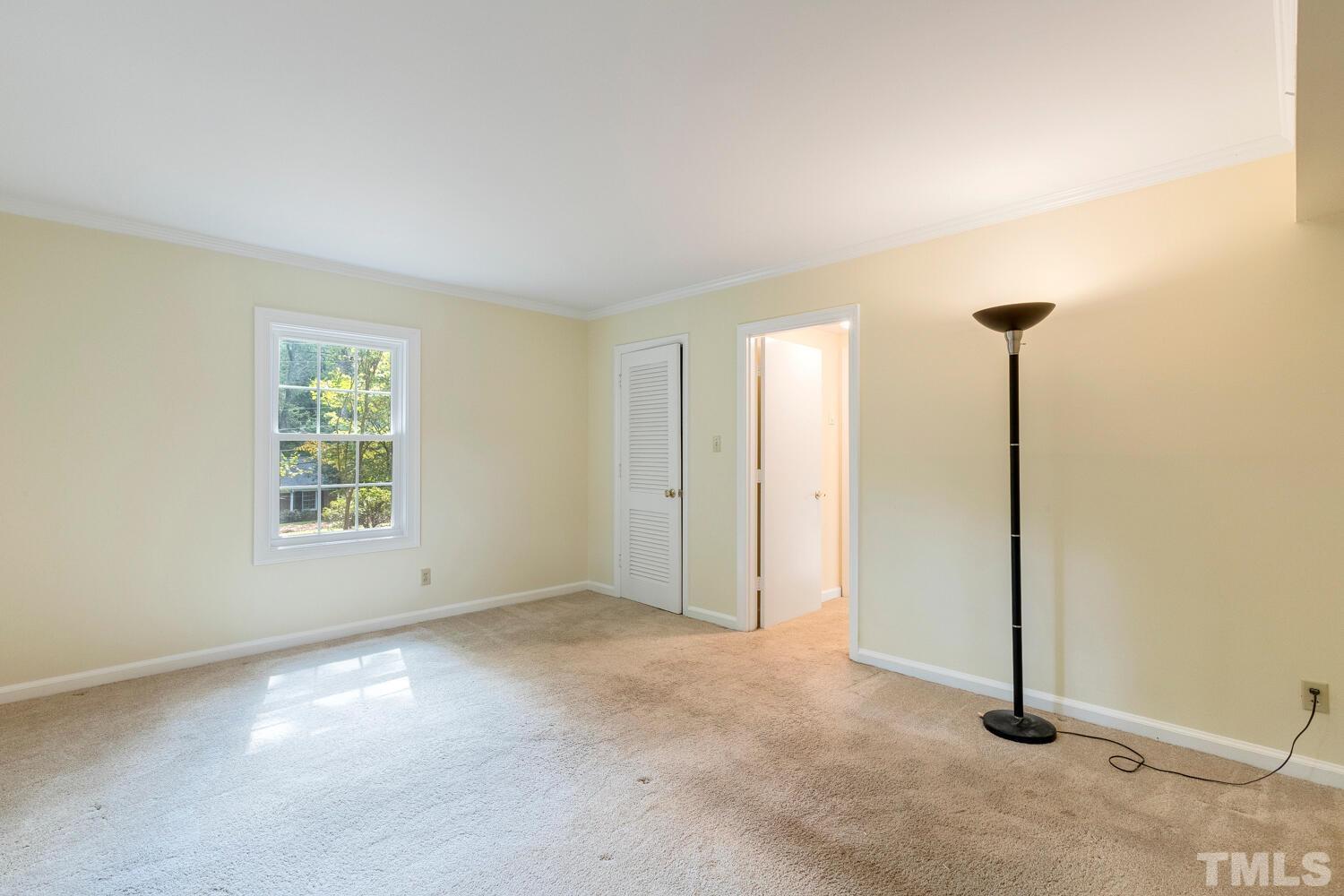 5004 Rembert Drive Raleigh, NC 27612 - Photo 38 of 61 an empty room with windows