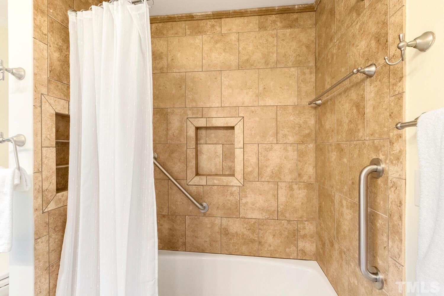5004 Rembert Drive Raleigh, NC 27612 - Photo 40 of 61 a bathroom with a shower