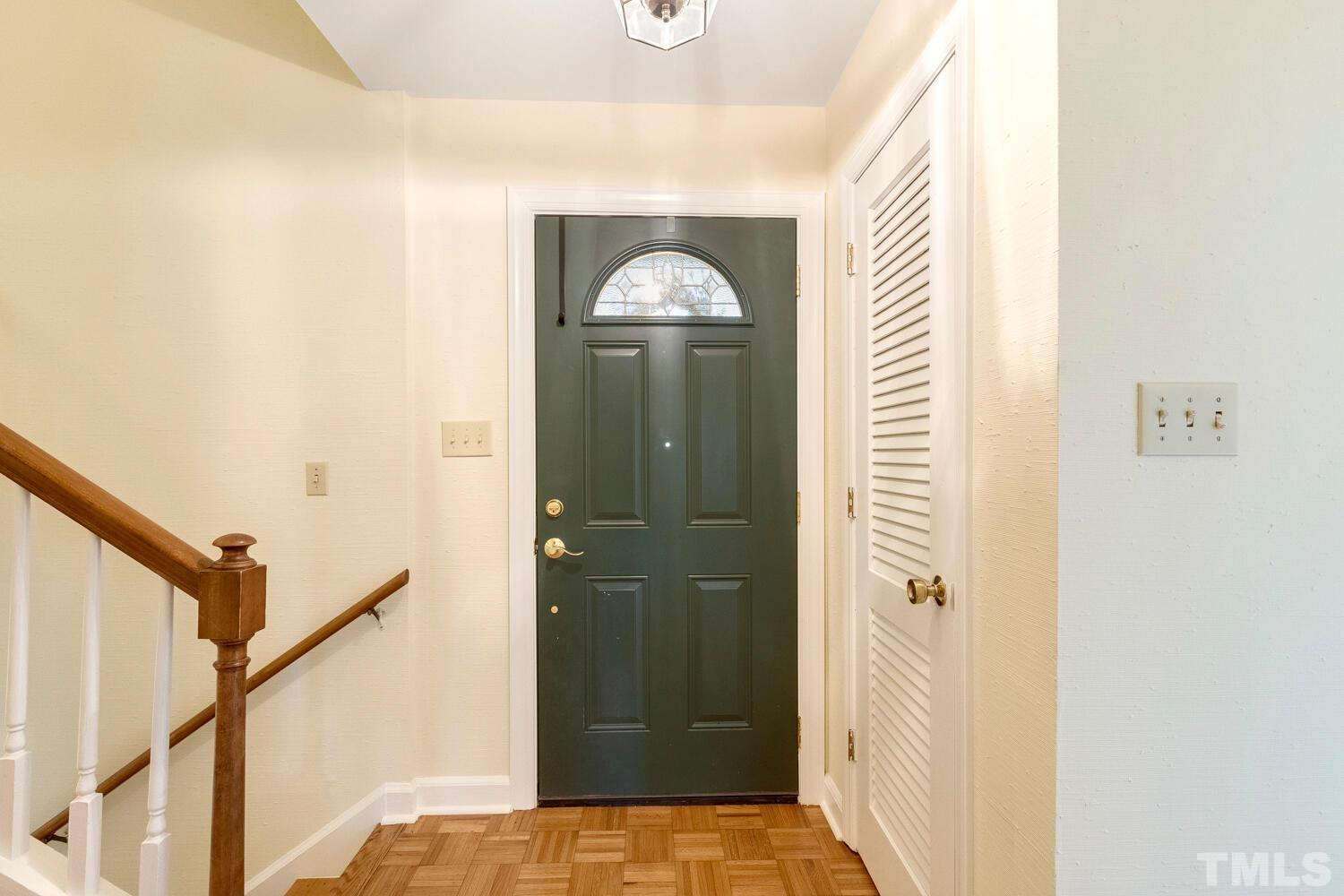 5004 Rembert Drive Raleigh, NC 27612 - Photo 4 of 61 a view of a hallway with front door