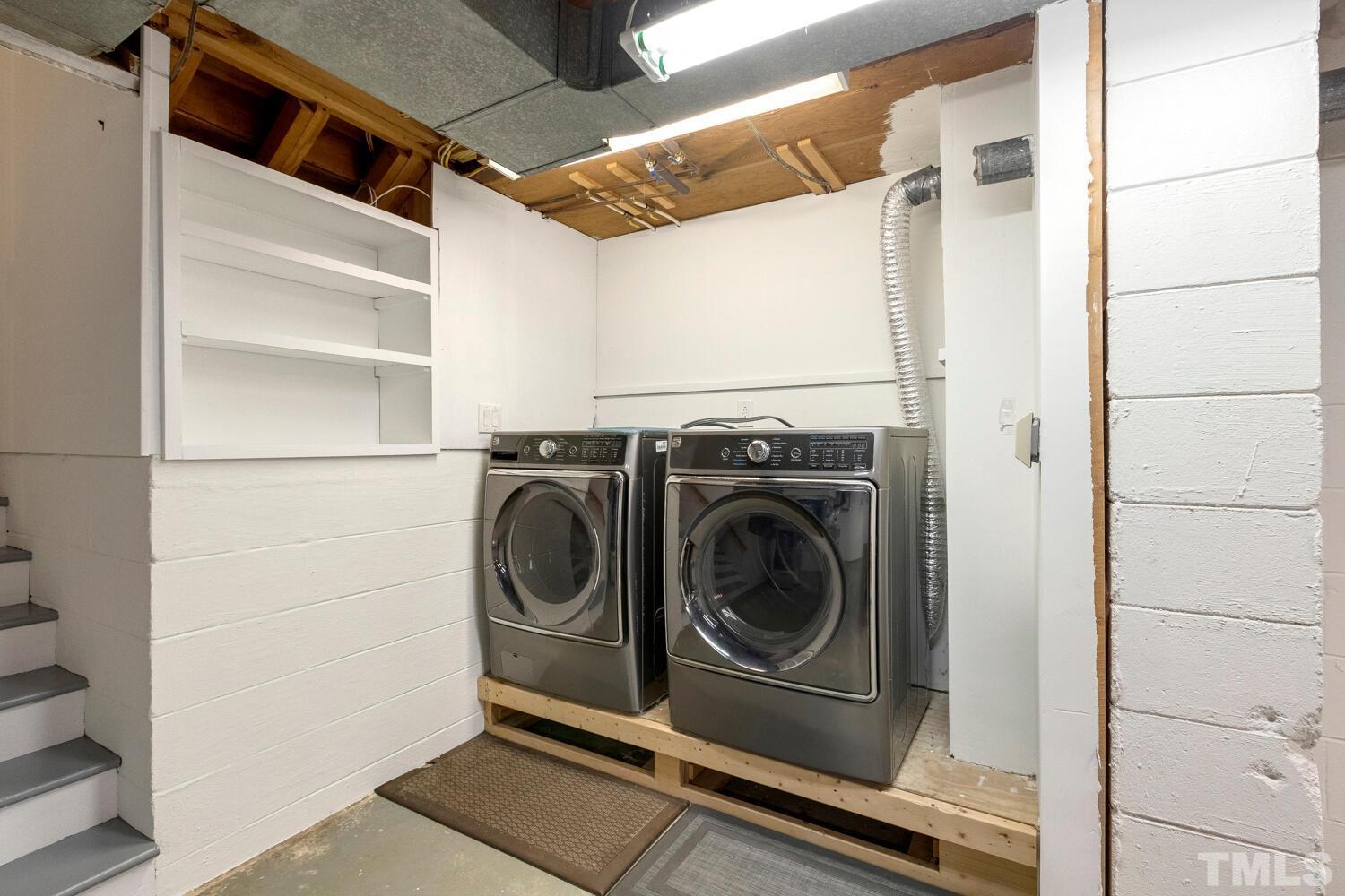 5004 Rembert Drive Raleigh, NC 27612 - Photo 41 of 61 a utility room with dryer and washer