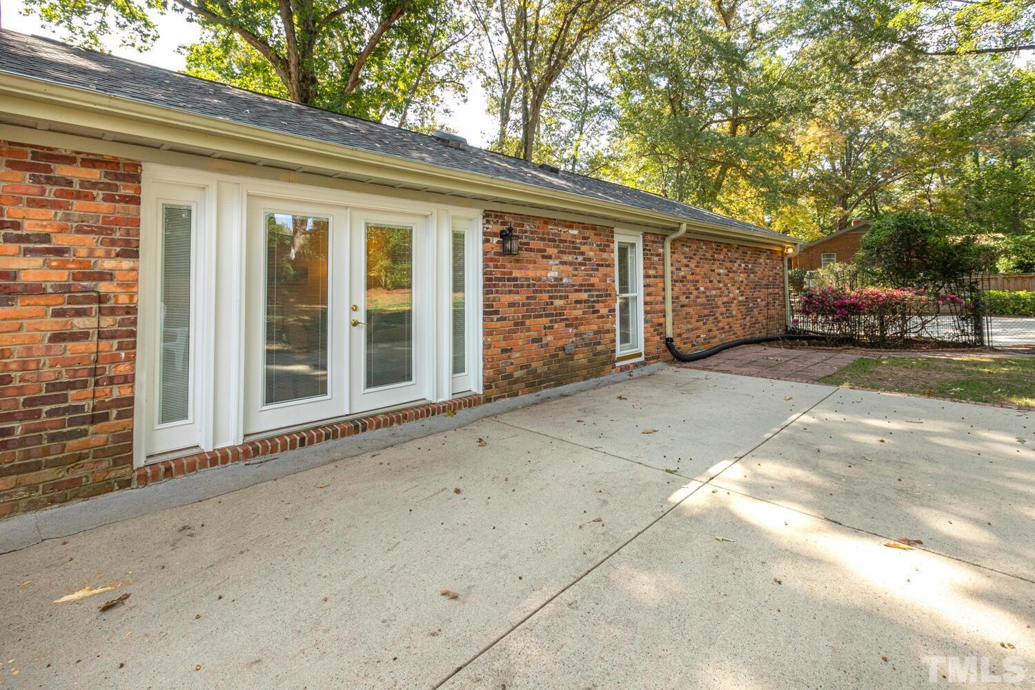 5004 Rembert Drive Raleigh, NC 27612 - Photo 49 of 61 a view of a house with a outdoor space