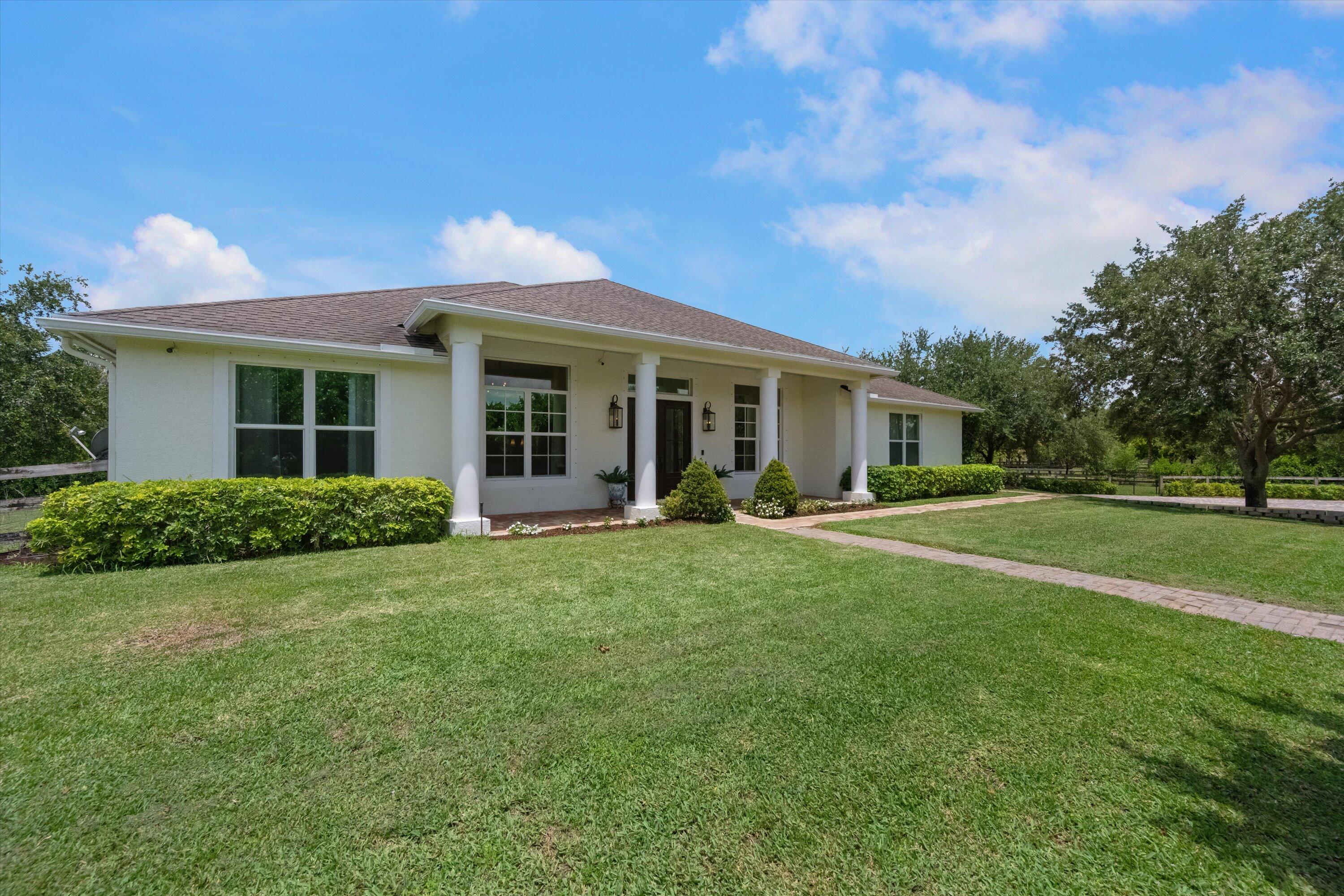 19986 Black Falcon Road Loxahatchee, FL 33470 - Photo 11 of 105 011-DSC_4236