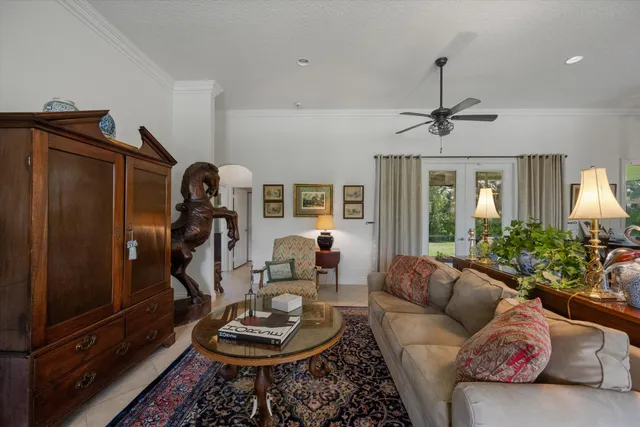 a bedroom with two beds and a window