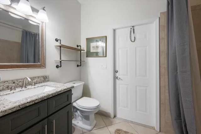 a view of a golf course with a lake