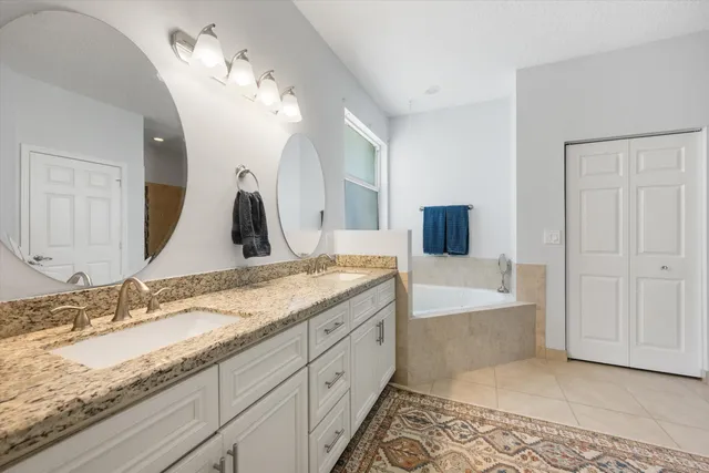 an aerial view of residential houses with outdoor space and street view