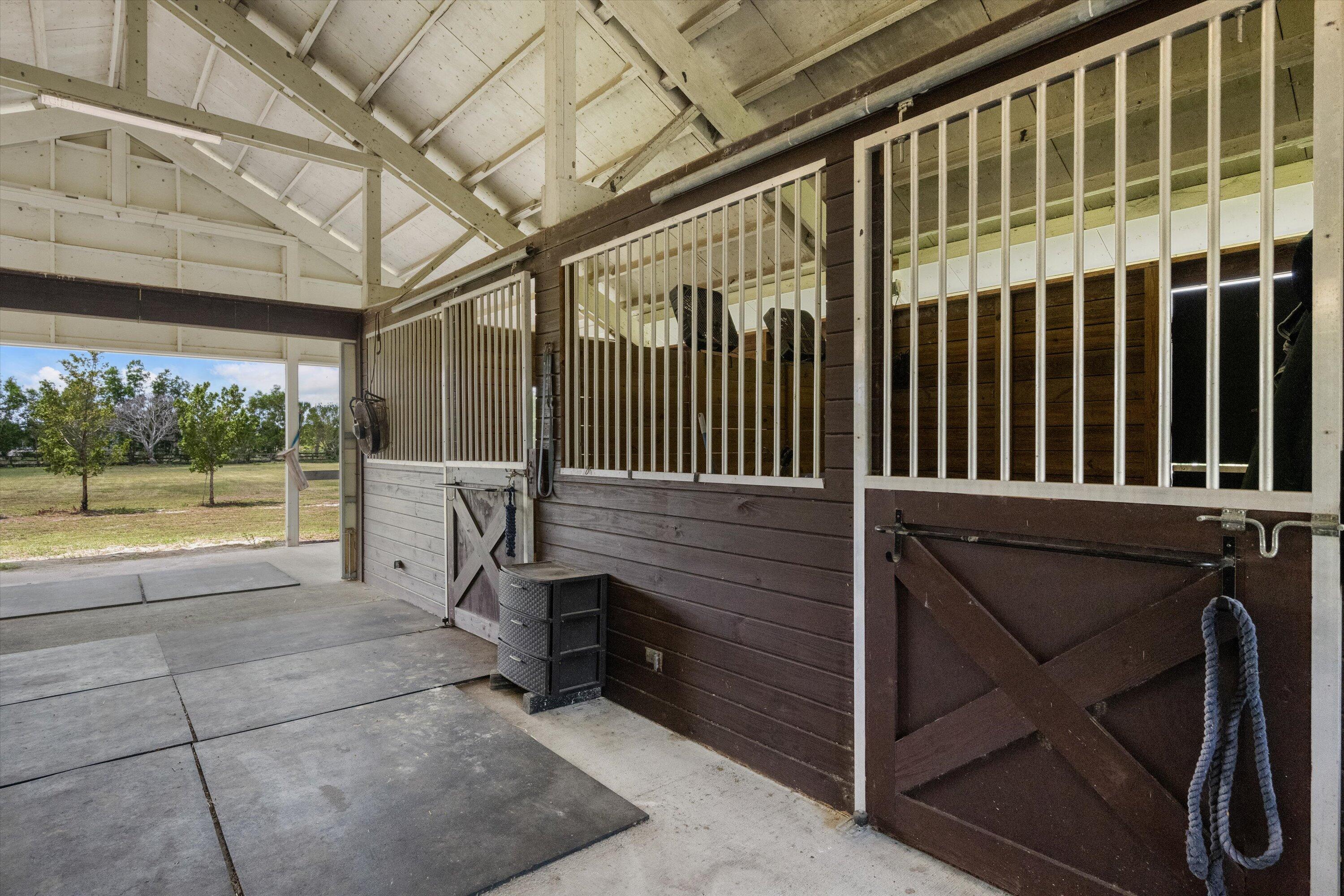19986 Black Falcon Road Loxahatchee, FL 33470 - Photo 86 of 105 a view of a porch