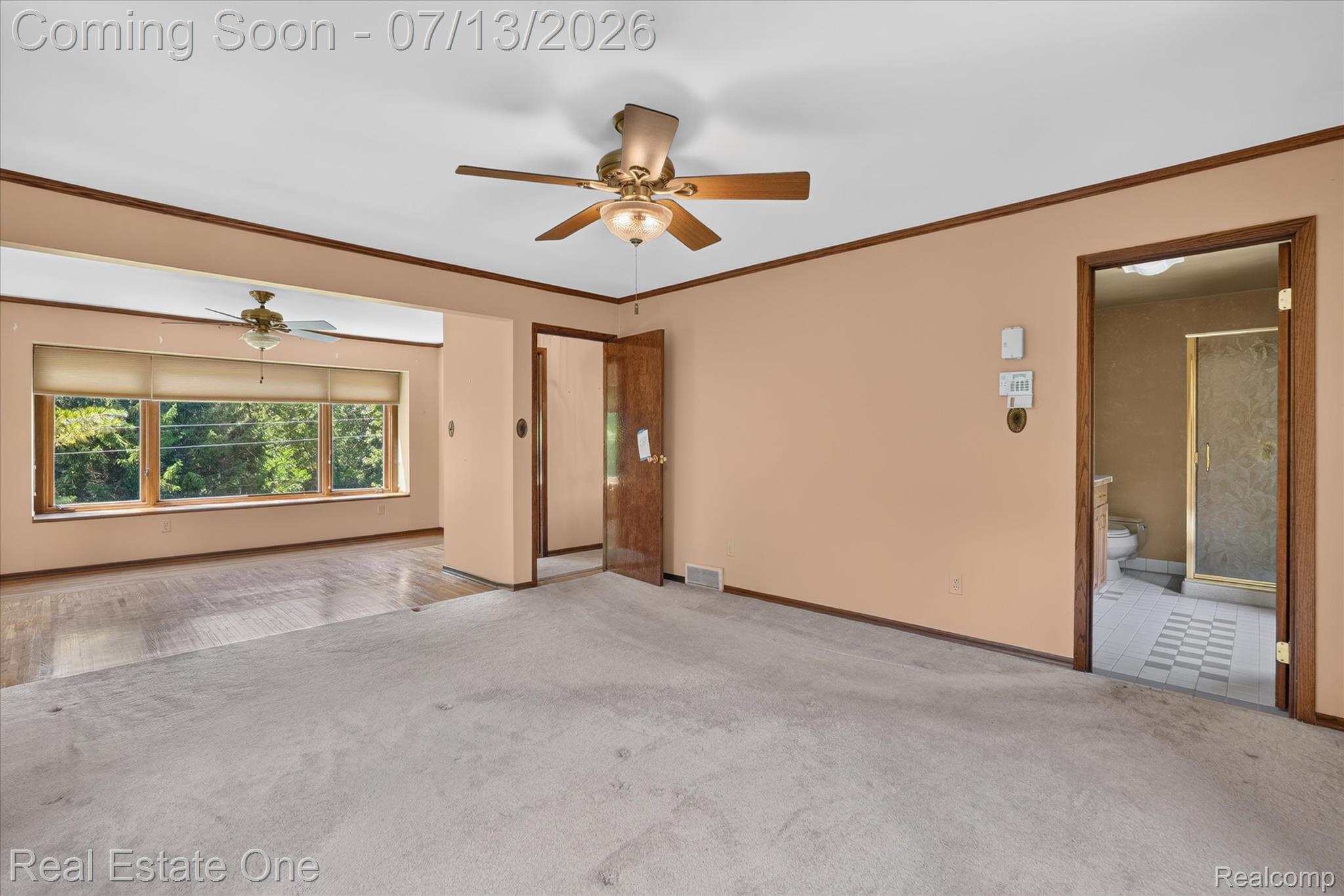 6039 Fish Lake Road Holly, MI 48442 - Photo 23 of 70 Hard wood under the carpet. Access to the Primary Bathroom