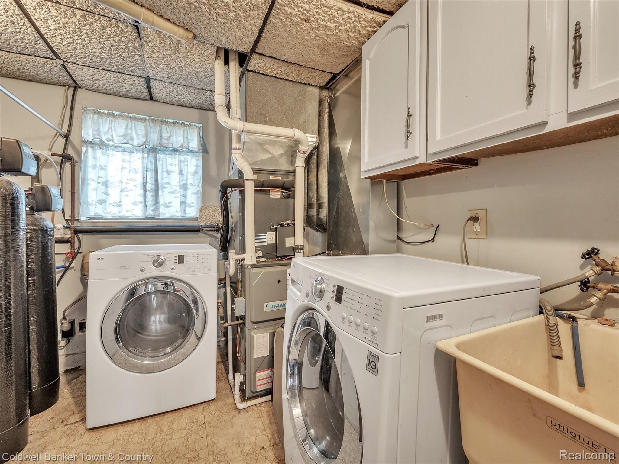 5432 Evans Road Holly, MI 48442 - Photo 33 of 39 Laundry Room with mechanicals. Furnace (2019), Water Softener (2019)