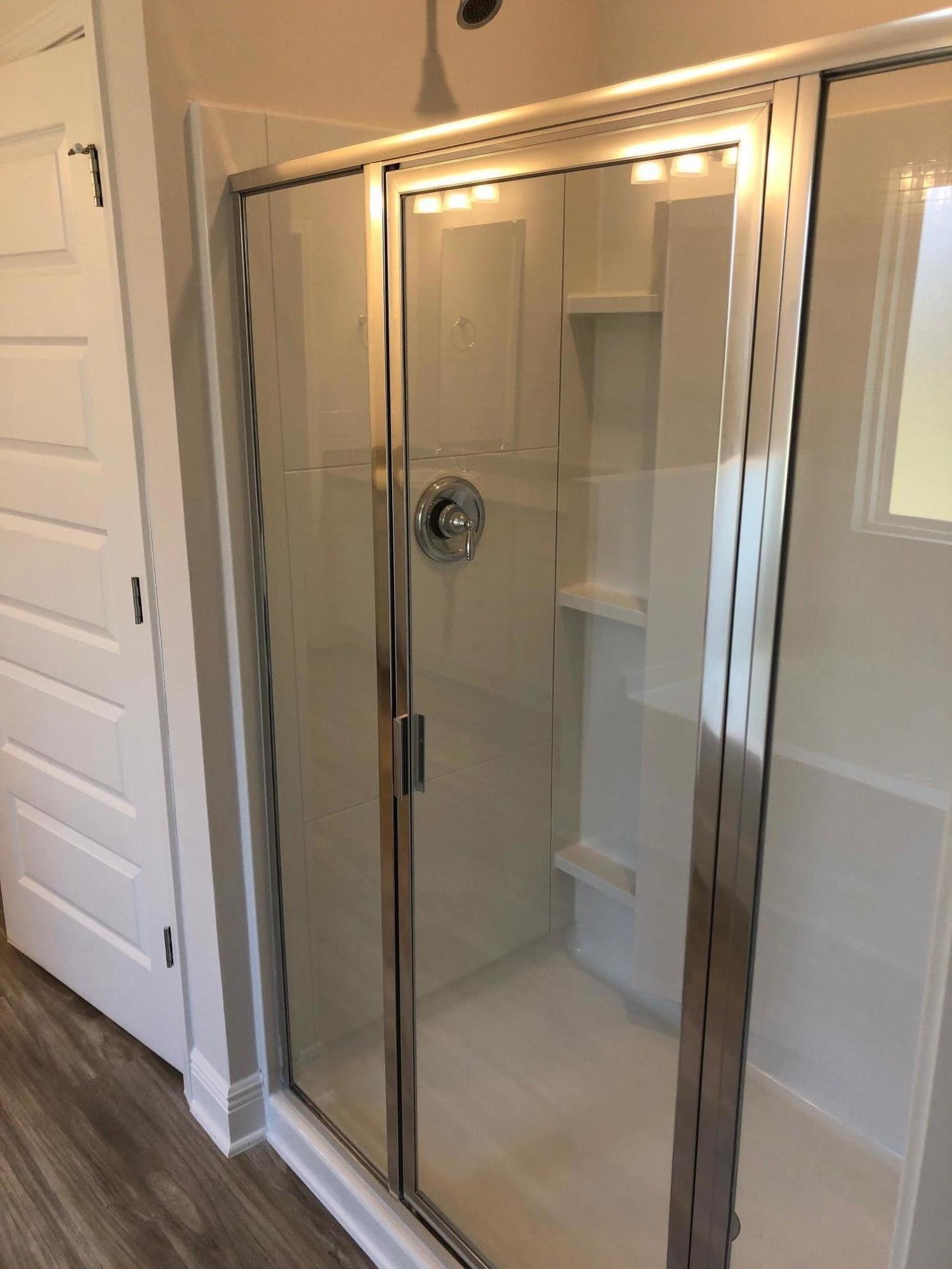6074 Carina Road Crestview, FL 32539 - Photo 22 of 28 a bathroom with a glass door shower