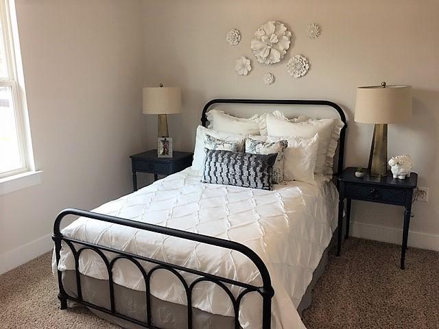 6074 Carina Road Crestview, FL 32539 - Photo 23 of 28 a bedroom with a bed and a window
