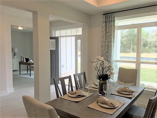 6074 Carina Road Crestview, FL 32539 - Photo 9 of 28 a view of a dining room with furniture window and outside view