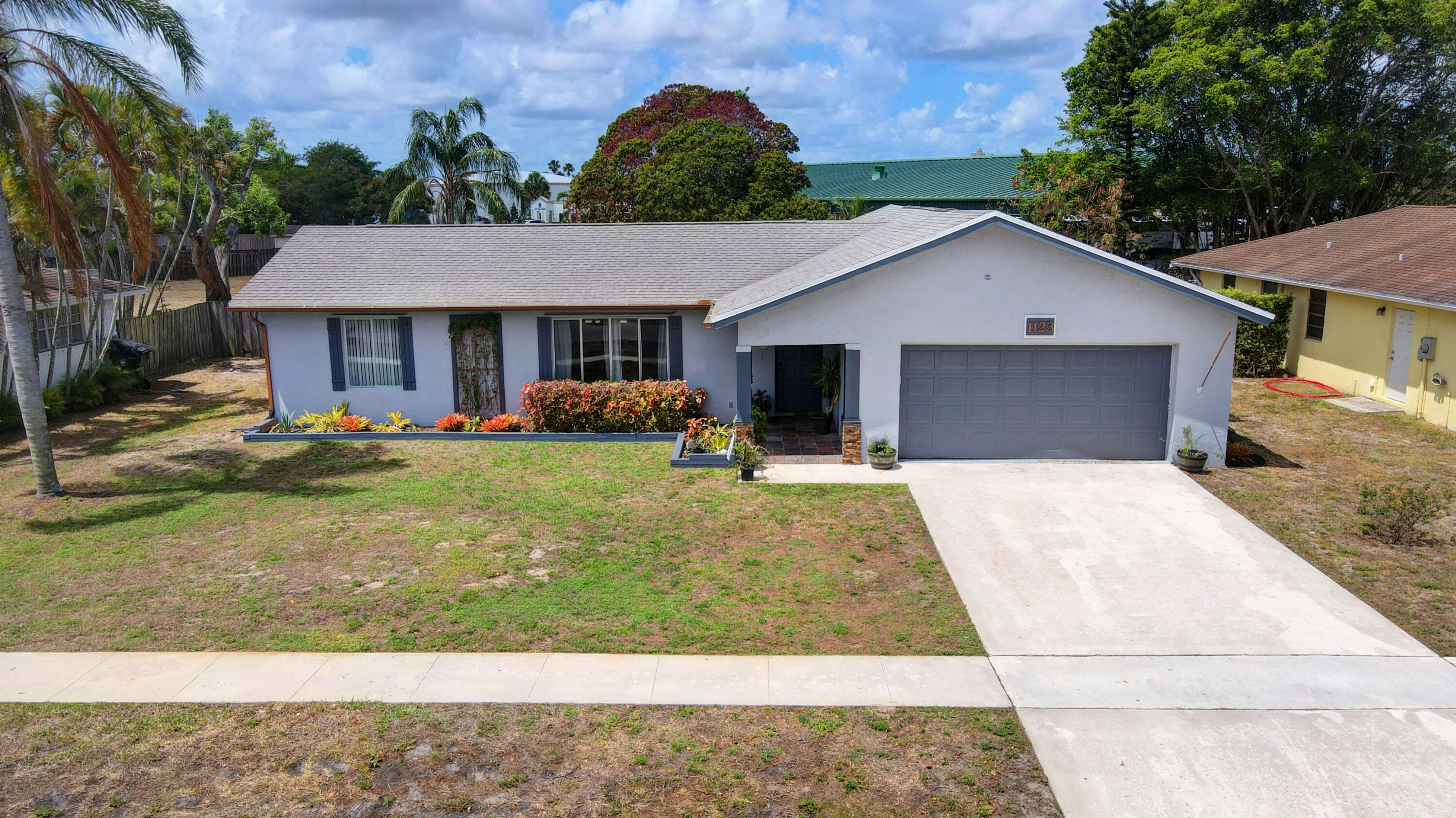 1123 Widgeon Road Wellington, FL 33414 - Photo 1 of 53 42_house air (1)