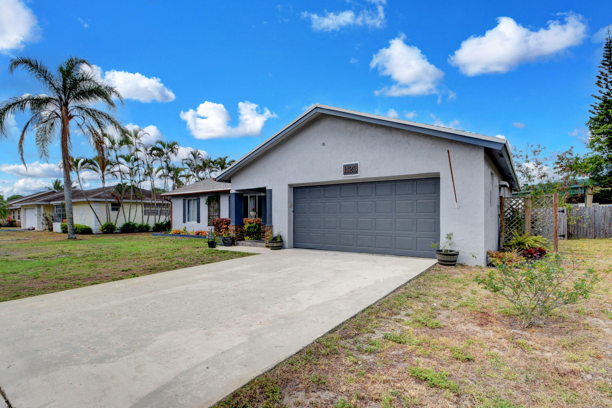 1123 Widgeon Road Wellington, FL 33414 - Photo 3 of 53 03_house (3)