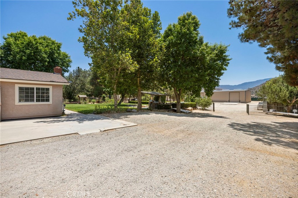 2883 Soledad Canyon Road Acton, CA 93510 - Photo 11 of 64 a view of a street with a house