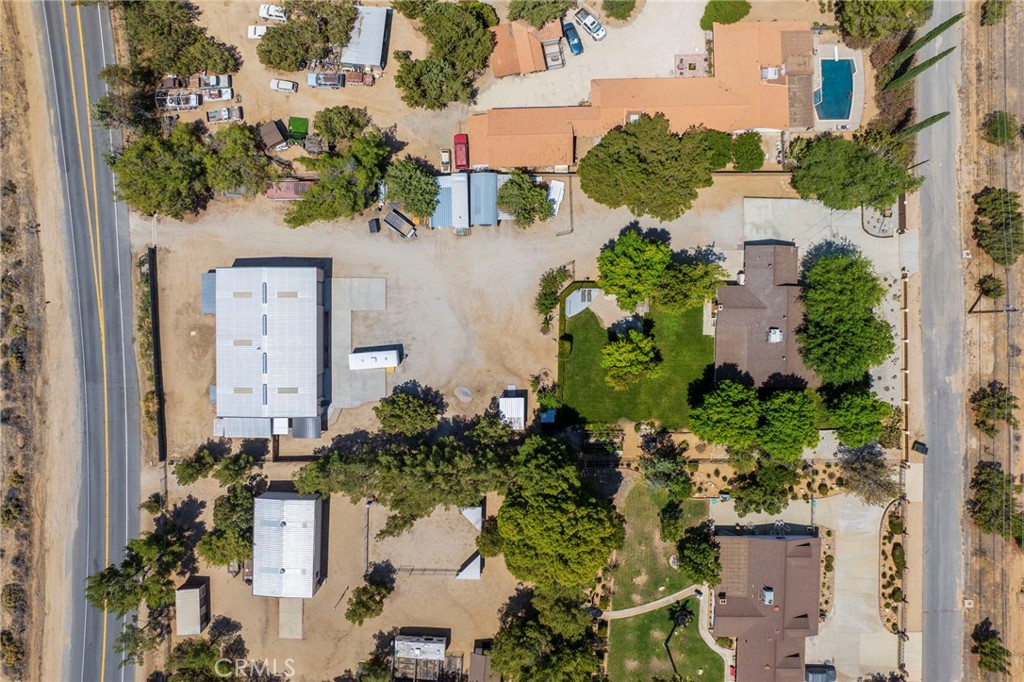 2883 Soledad Canyon Road Acton, CA 93510 - Photo 46 of 64 an aerial view of a house with a yard and large trees