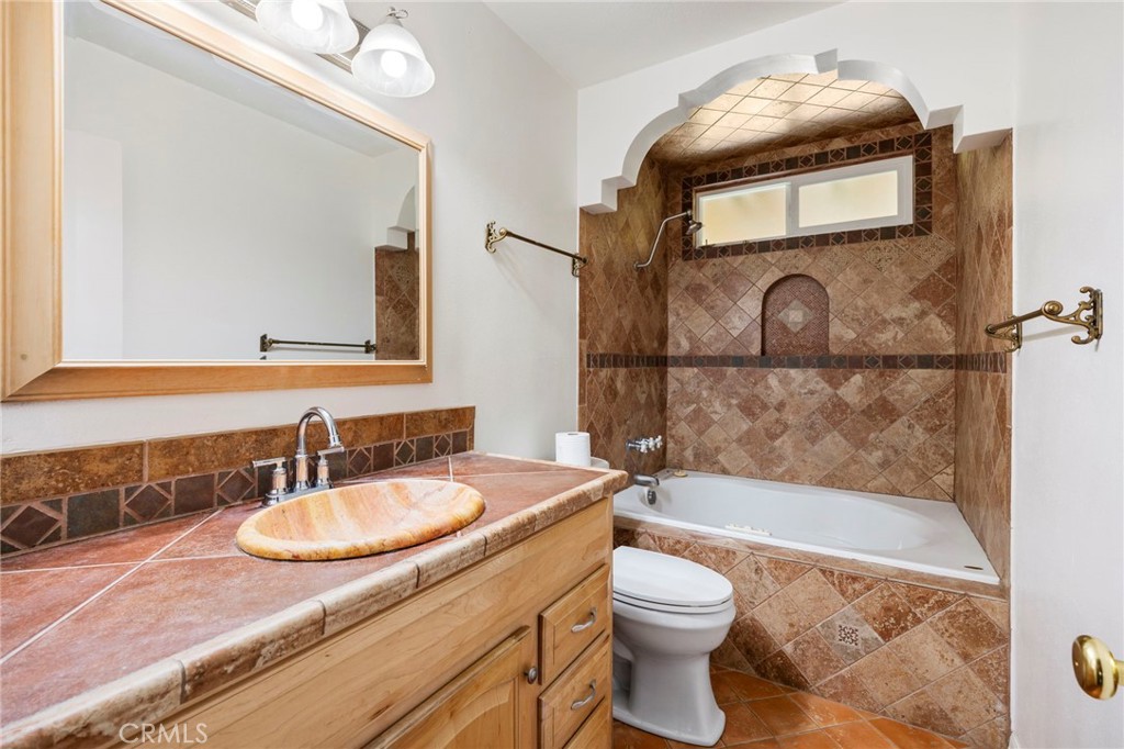 2883 Soledad Canyon Road Acton, CA 93510 - Photo 53 of 64 a bathroom with a sink and a mirror