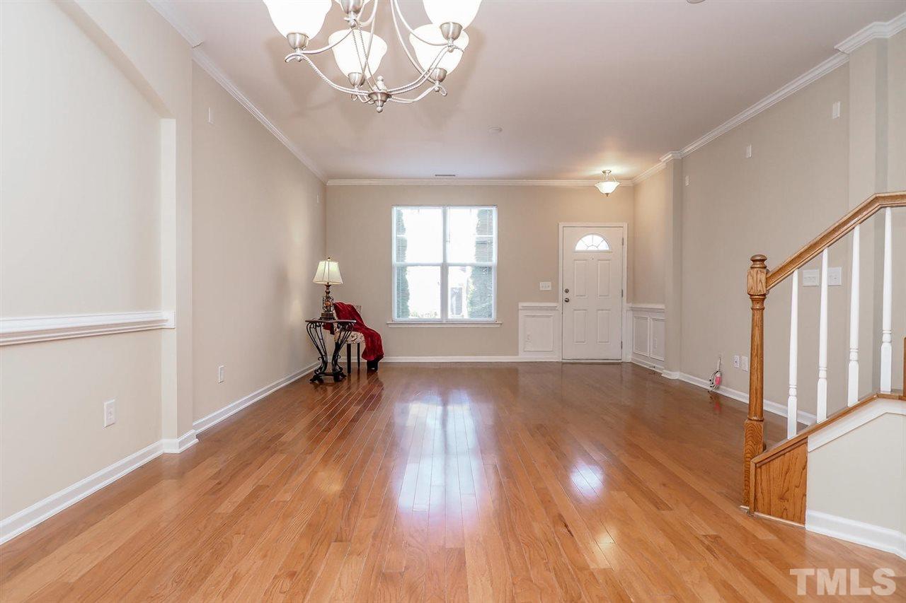 2965 Casona Way Raleigh, NC 27616 - Photo 11 of 25 a very nice looking room with wooden floor and workspace