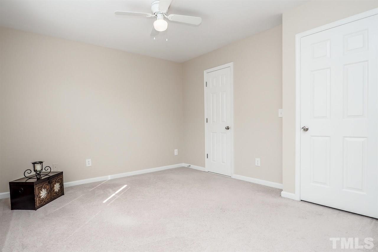 2965 Casona Way Raleigh, NC 27616 - Photo 18 of 25 a view of an empty room with a window
