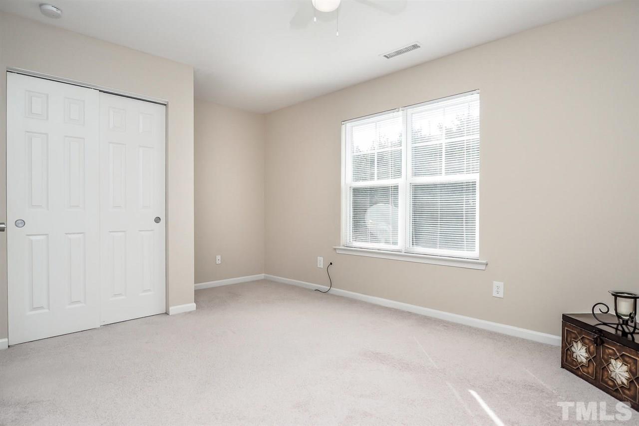 2965 Casona Way Raleigh, NC 27616 - Photo 19 of 25 an empty room with windows