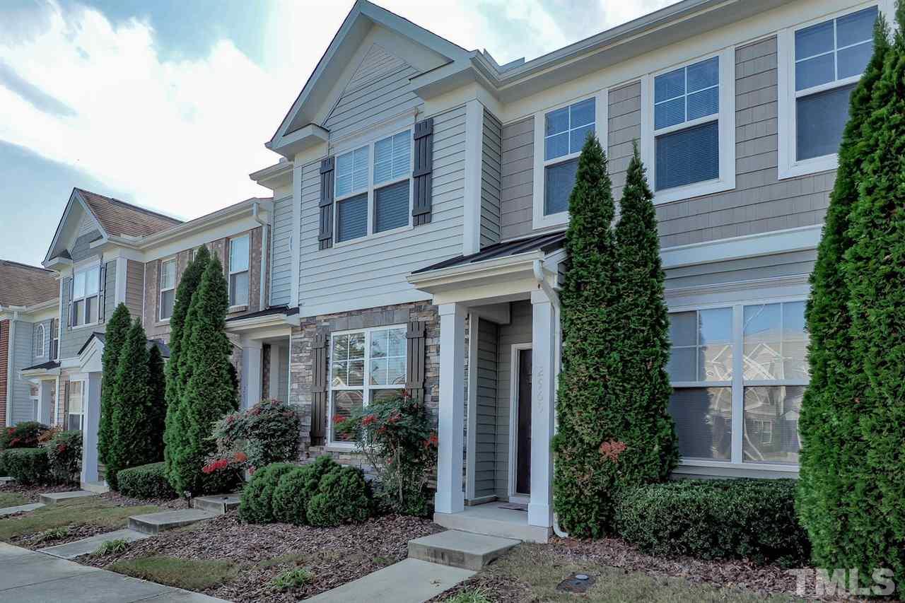 2965 Casona Way Raleigh, NC 27616 - Photo 2 of 25 a front view of a house with garden