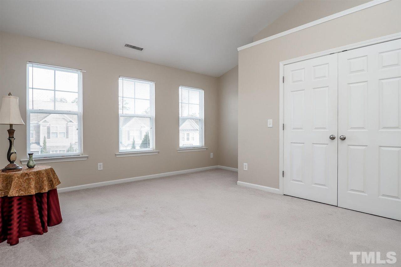 2965 Casona Way Raleigh, NC 27616 - Photo 22 of 25 an empty room with windows