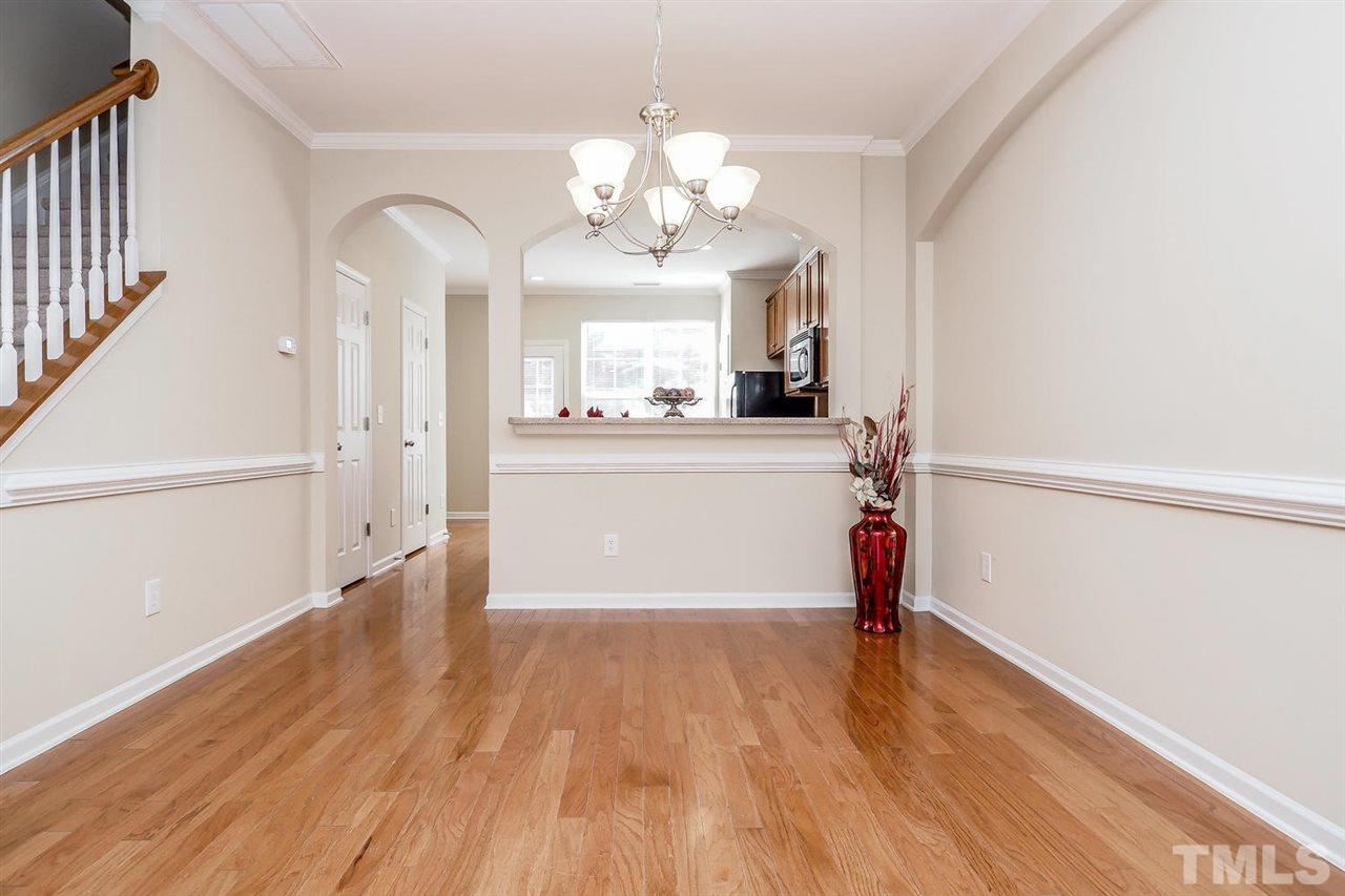 2965 Casona Way Raleigh, NC 27616 - Photo 9 of 25 a view of a livingroom with wooden floor