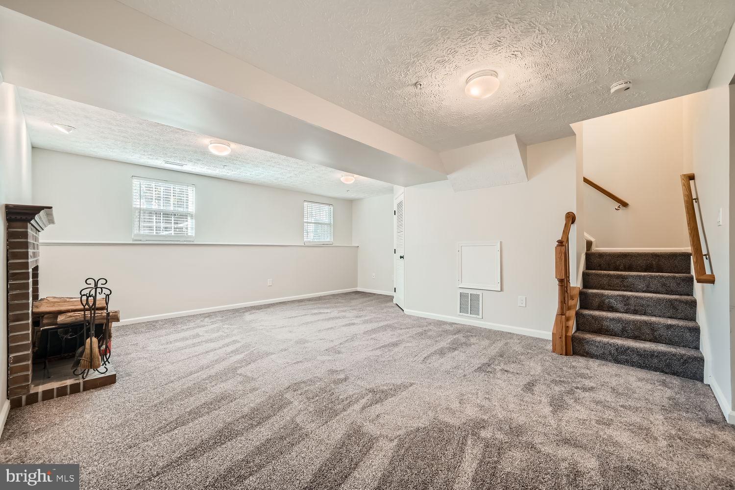 8540 Pine Meadows Drive Odenton, MD 21113 - Photo 23 of 29 a view of an empty room with stairs and ventilation