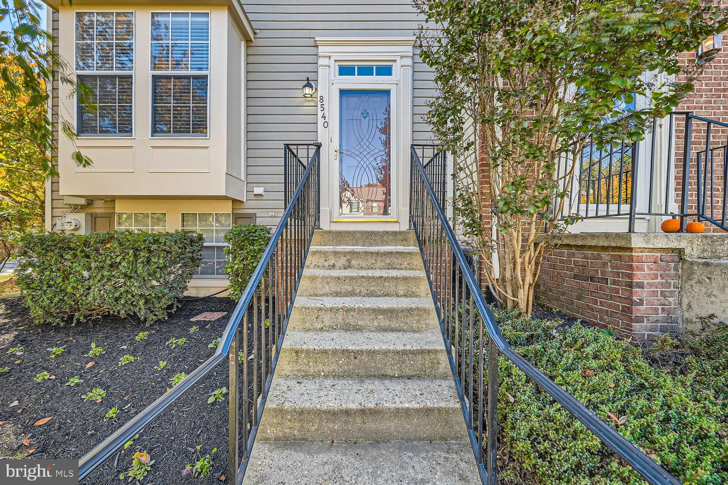 8540 Pine Meadows Drive Odenton, MD 21113 - Photo 3 of 29 a view of a garden with pathway