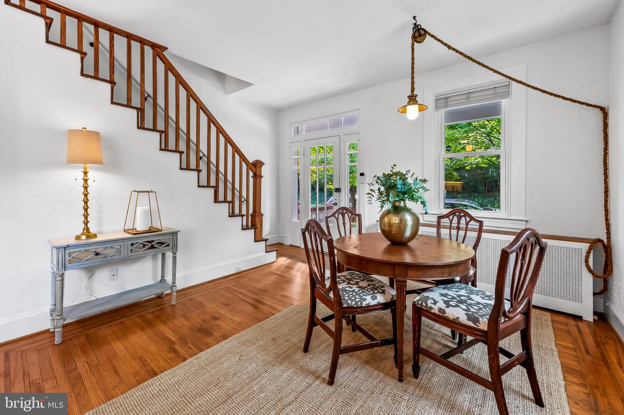 4513 Wilmslow Road Baltimore, MD 21210 - Photo 11 of 65 Dining area with walnut-banded hardwood flooring