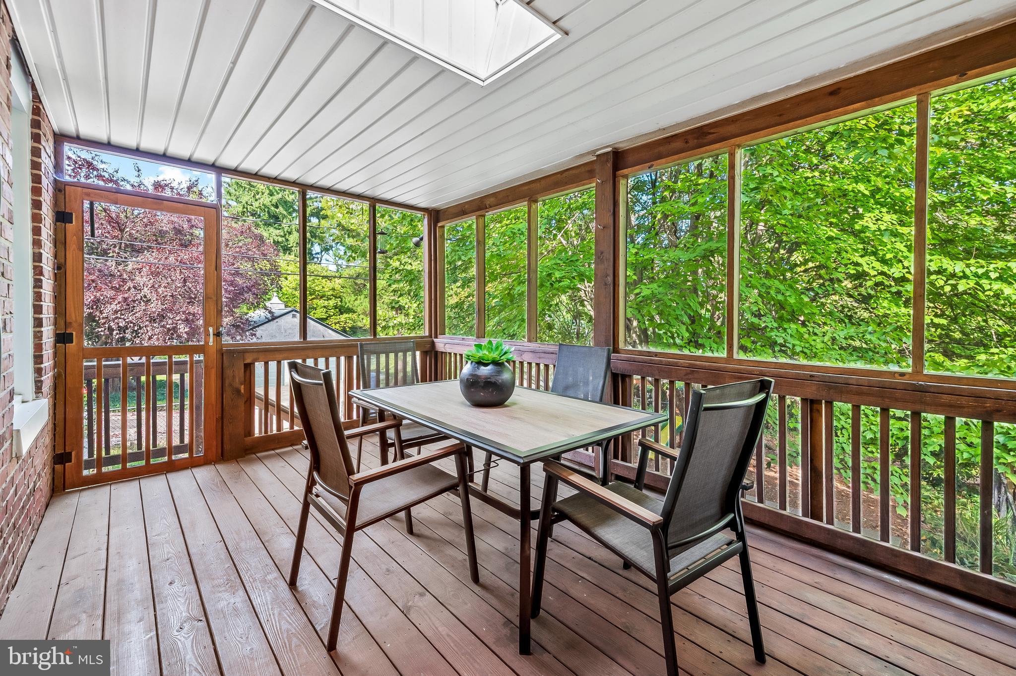 4513 Wilmslow Road Baltimore, MD 21210 - Photo 20 of 65 Screened-in porch overlooking back yard