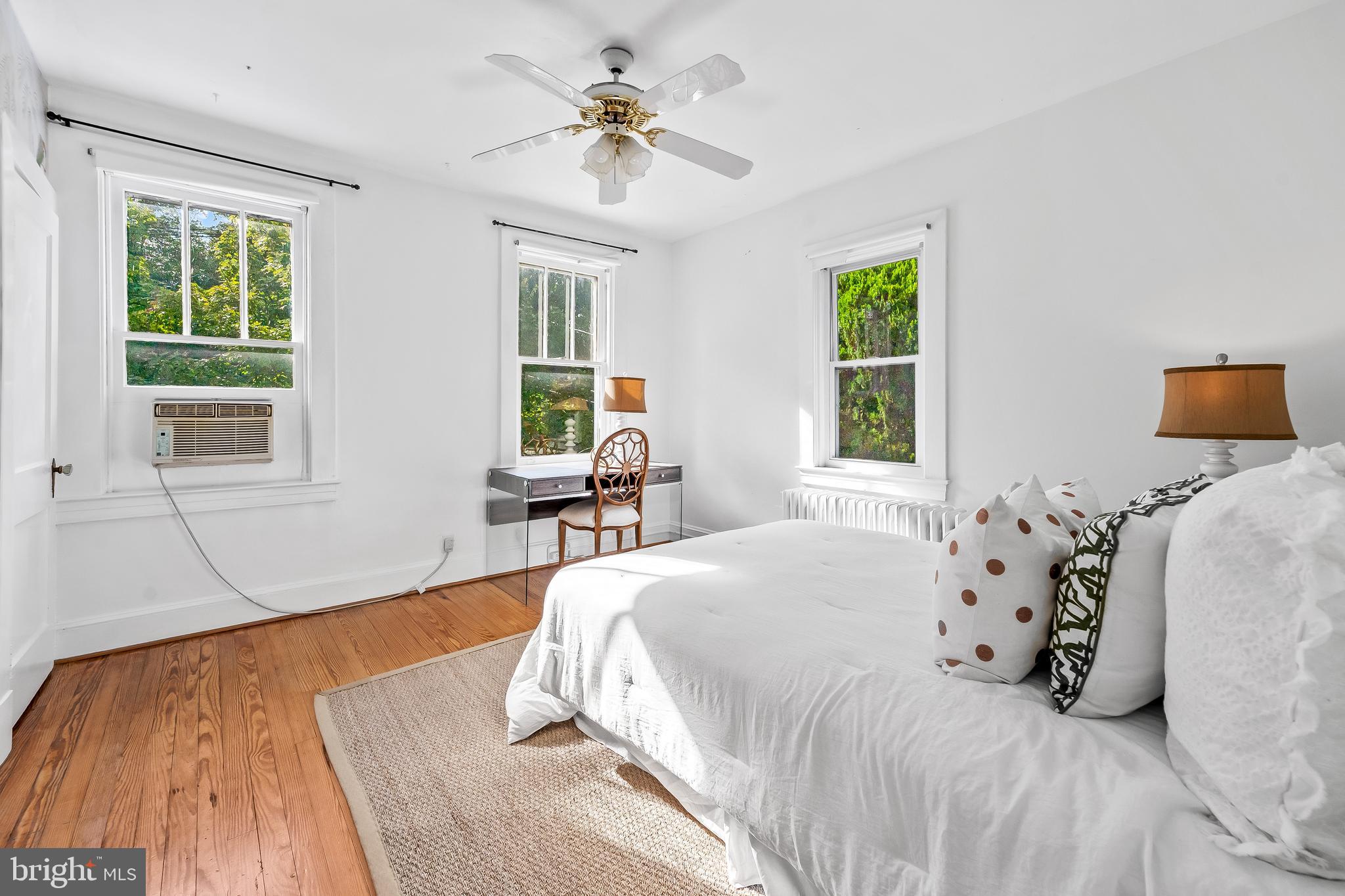 4513 Wilmslow Road Baltimore, MD 21210 - Photo 28 of 65 Second bedroom w/ ceiling fans and hardwood floors