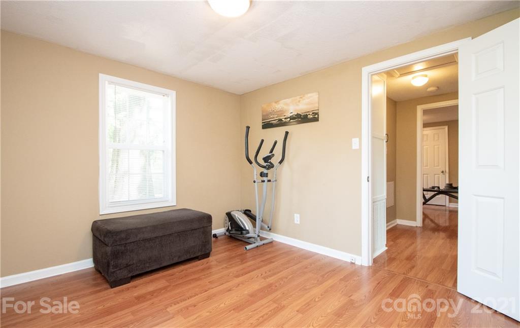 2612 Long Hope Road Monroe, NC 28112 - Photo 22 of 32 a view of a room with gym equipment and a window