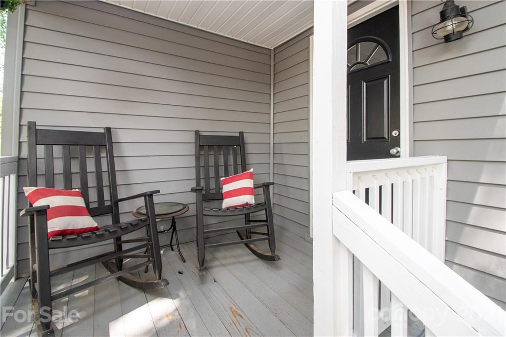 2612 Long Hope Road Monroe, NC 28112 - Photo 5 of 32 a view of a balcony with chairs