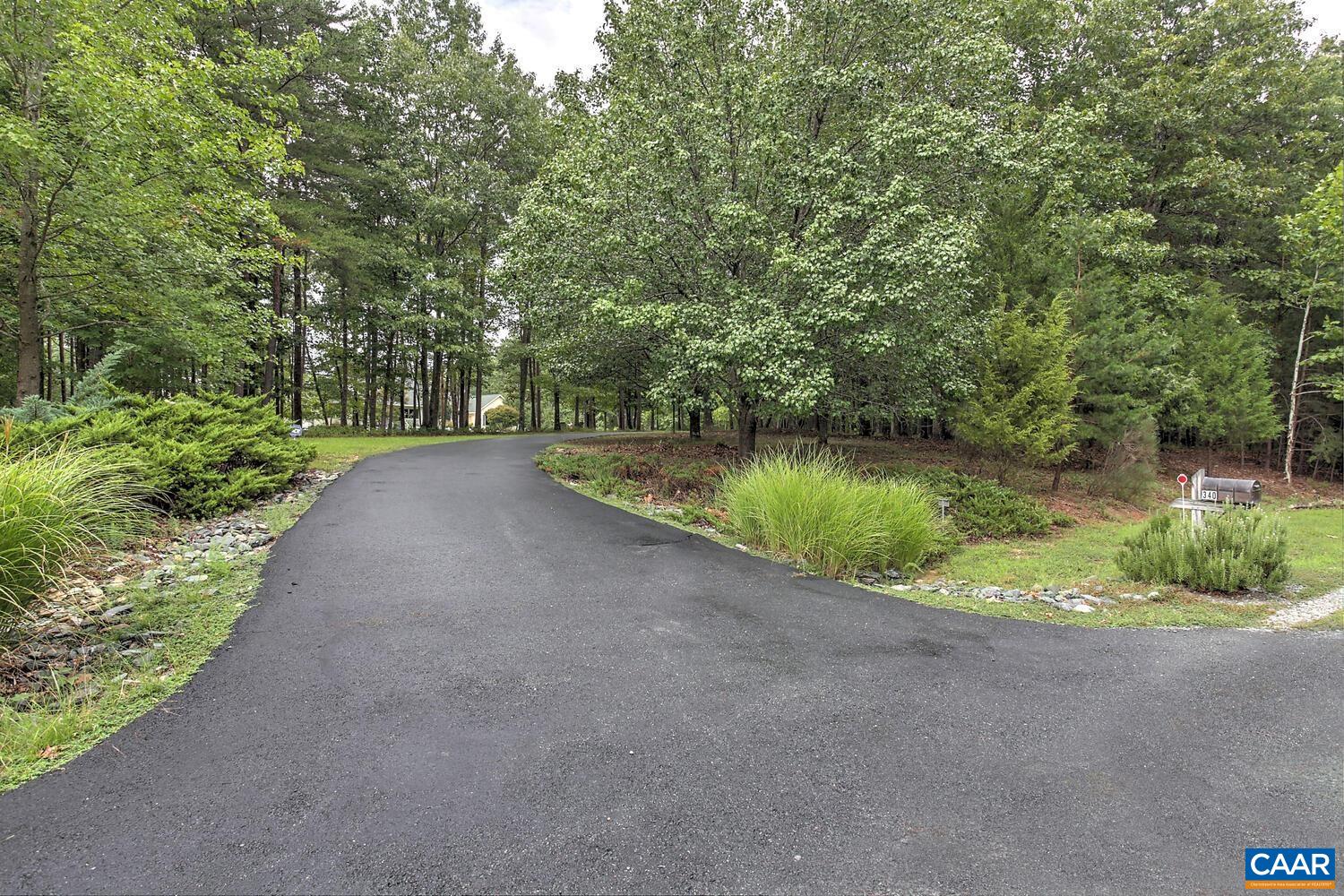 340 Beaver Pond Ridge Troy, VA 22974 - Photo 12 of 53 a view of a lake with a yard