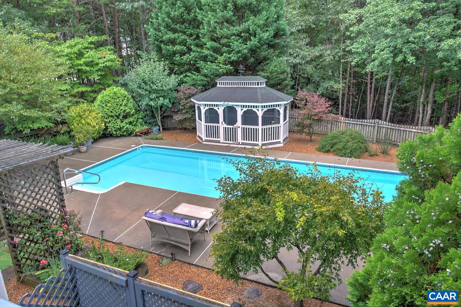 340 Beaver Pond Ridge Troy, VA 22974 - Photo 28 of 53 a view of a big yard with table and chairs and potted plants