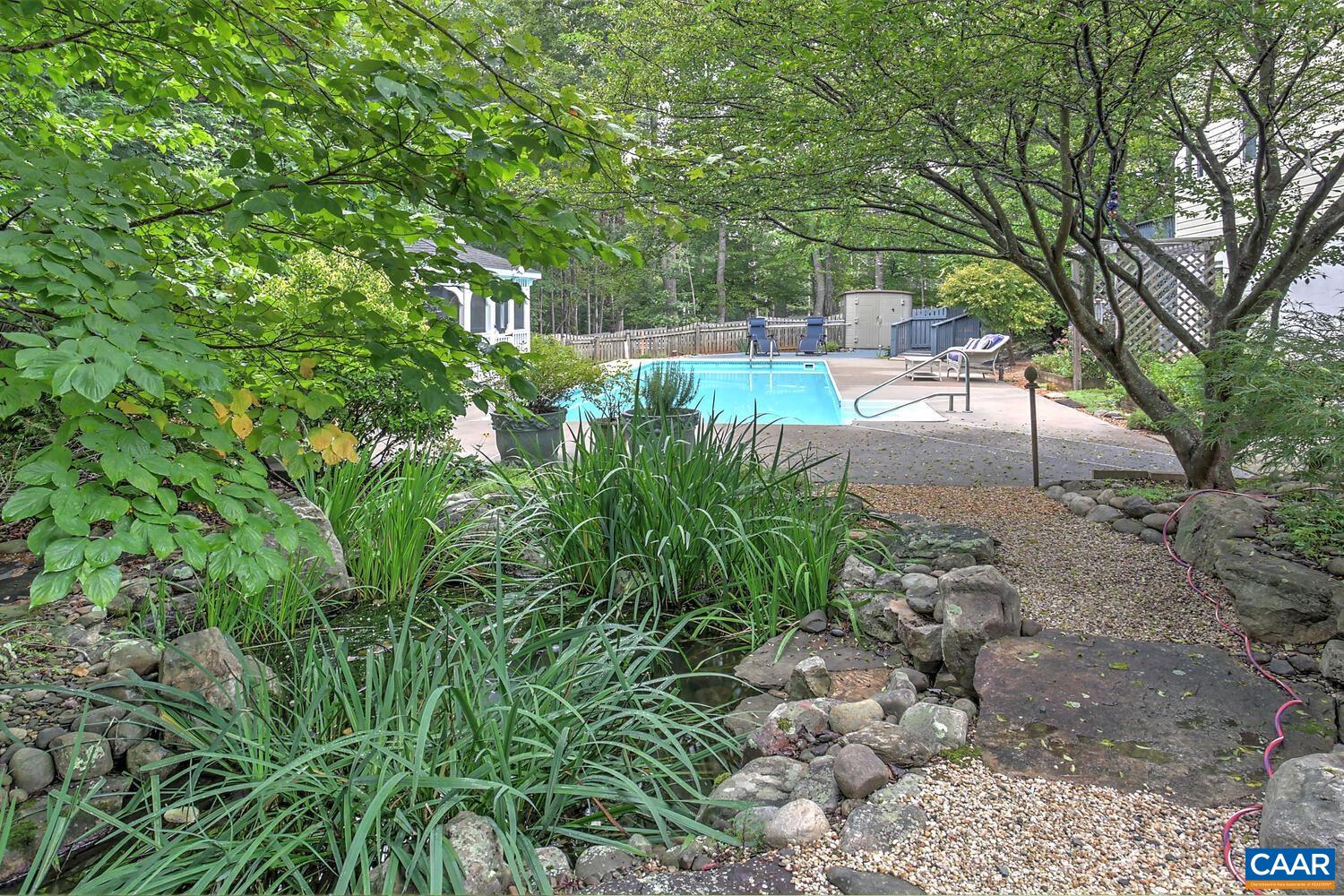 340 Beaver Pond Ridge Troy, VA 22974 - Photo 30 of 53 a backyard of a house with lots of green space