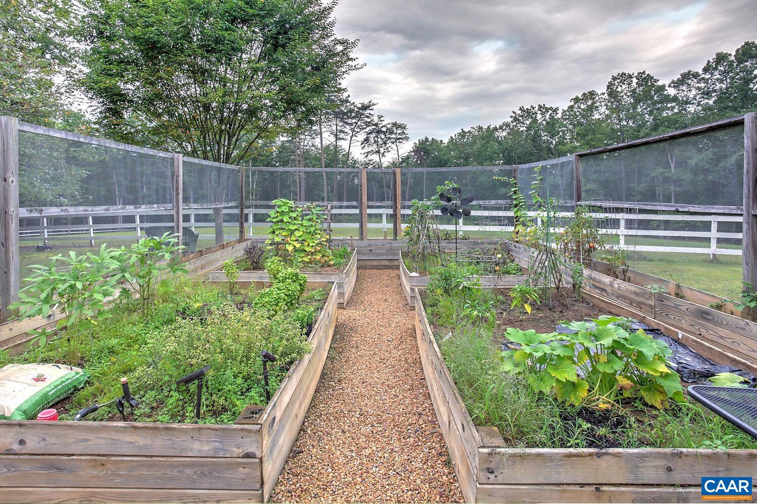 340 Beaver Pond Ridge Troy, VA 22974 - Photo 33 of 53 a view of a garden with wooden floor