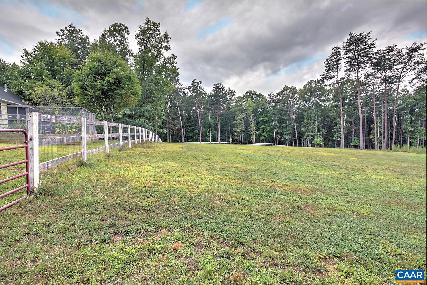 340 Beaver Pond Ridge Troy, VA 22974 - Photo 34 of 53 a view of a swimming pool with a big yard and large trees