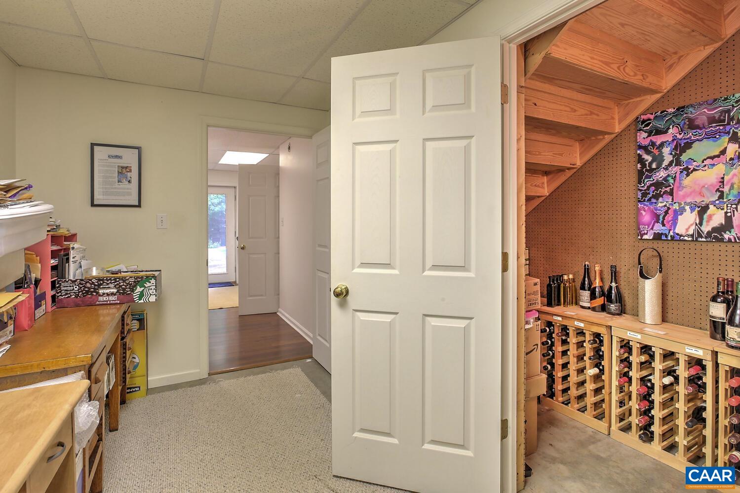 340 Beaver Pond Ridge Troy, VA 22974 - Photo 40 of 53 workspace with wooden floor and closet